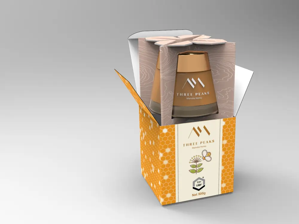 Printed e-commerce box with an internal fitment holding a glass honey jar securely