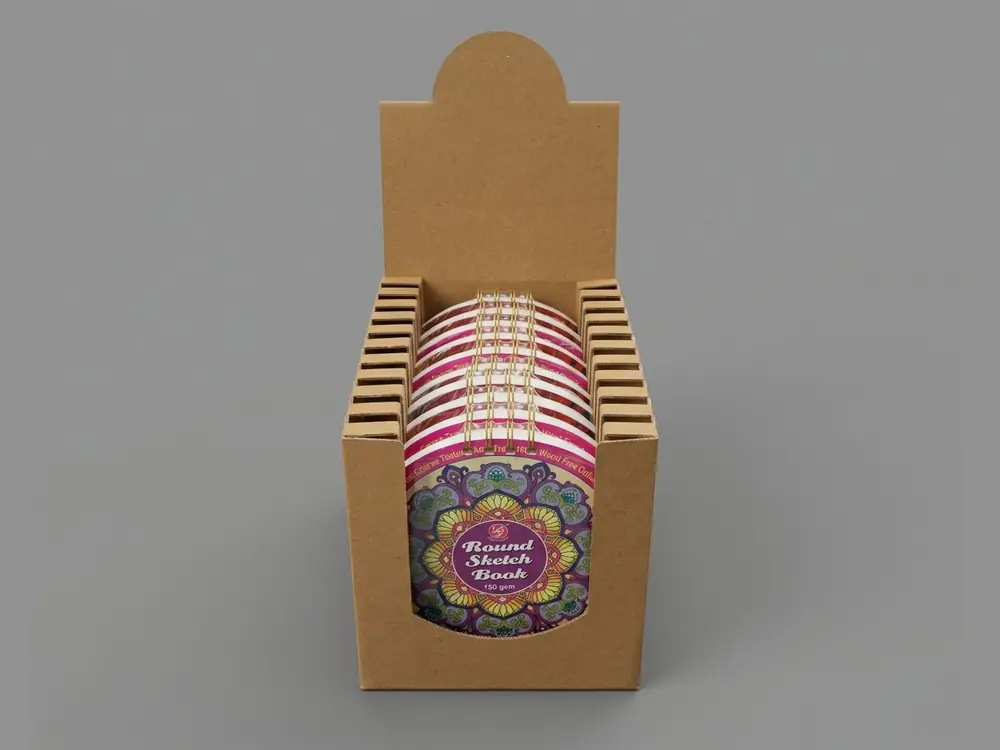 Kraft corrugated counter display unit with slotted sides holding round sketch books