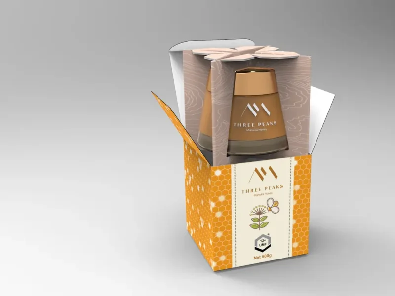 Printed e-commerce box with an internal fitment holding a glass honey jar securely